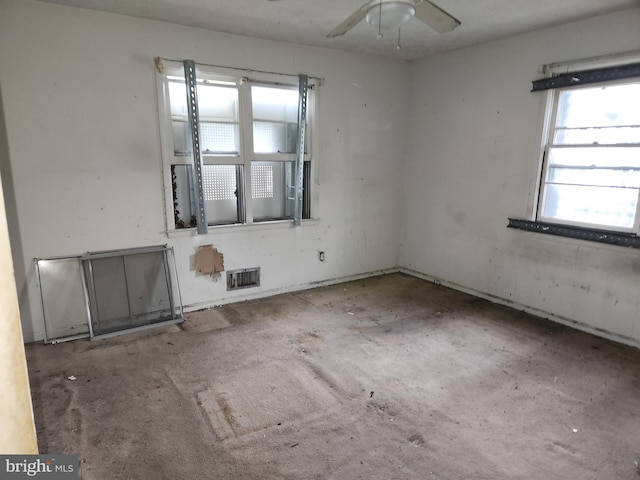 130 5th Ave, Baltimore, MD 21227 - empty room with ceiling fan and concrete flooring