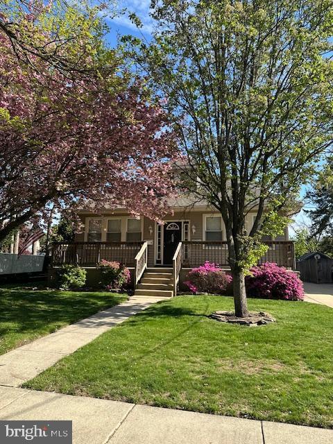 1104 High St, Haddon Heights, NJ 08035 - obstructed view of property featuring a front yard and covered porch