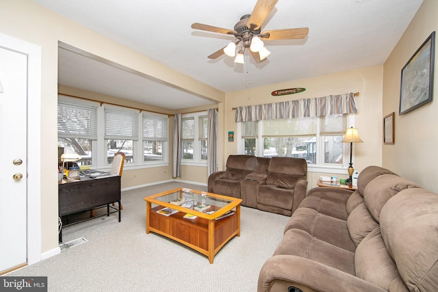 1104 High St, Haddon Heights, NJ 08035 - living room featuring ceiling fan, light colored carpet, and baseboards