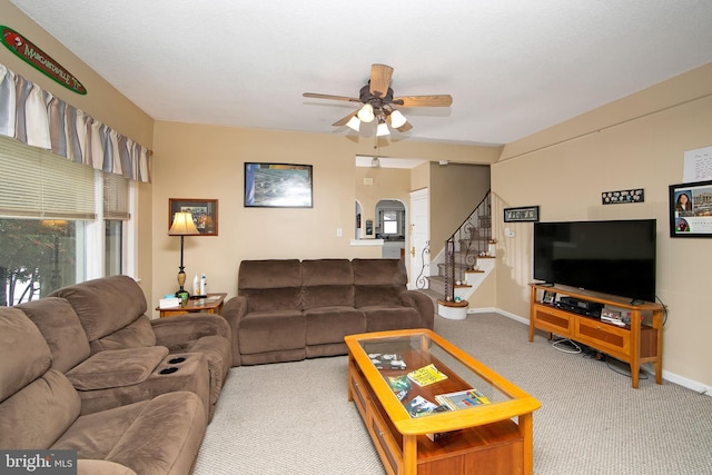 1104 High St, Haddon Heights, NJ 08035 - living area with carpet floors, ceiling fan, stairway, and baseboards