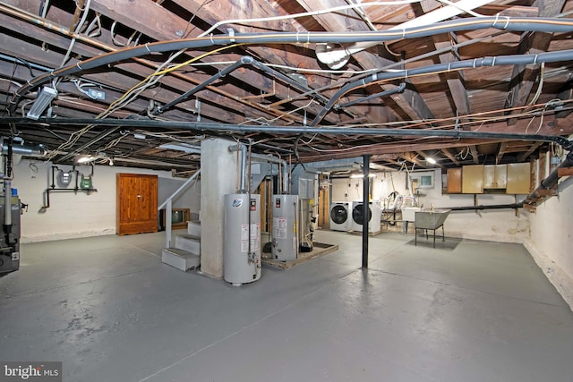 1104 High St, Haddon Heights, NJ 08035 - unfinished basement featuring gas water heater, stairs, and independent washer and dryer