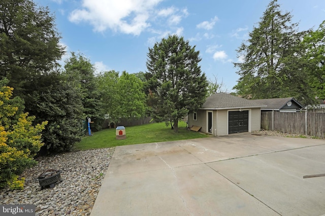 1104 High St, Haddon Heights, NJ 08035 - view of yard with an outbuilding, a garage, and concrete driveway