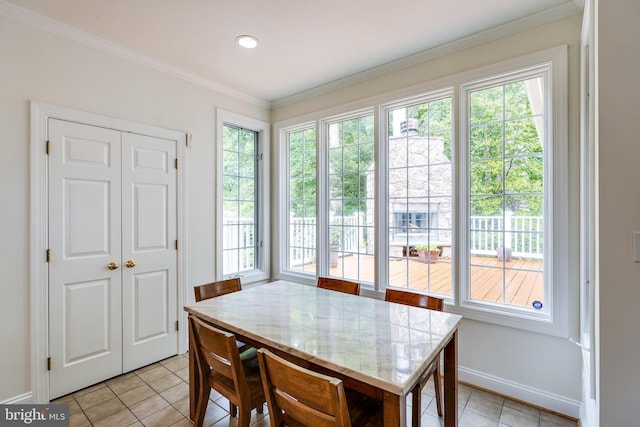 6732 Baron Rd, Mclean, VA 22101 - dining space with light tile patterned flooring, baseboards, and crown molding