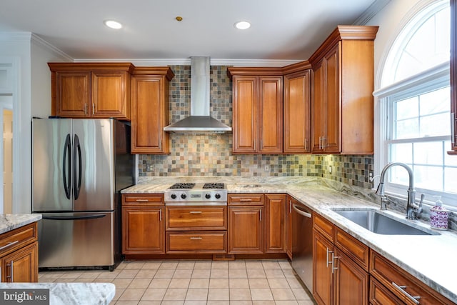 6732 Baron Rd, Mclean, VA 22101 - kitchen featuring stainless steel appliances, wall chimney exhaust hood, a sink, brown cabinetry, and ornamental molding