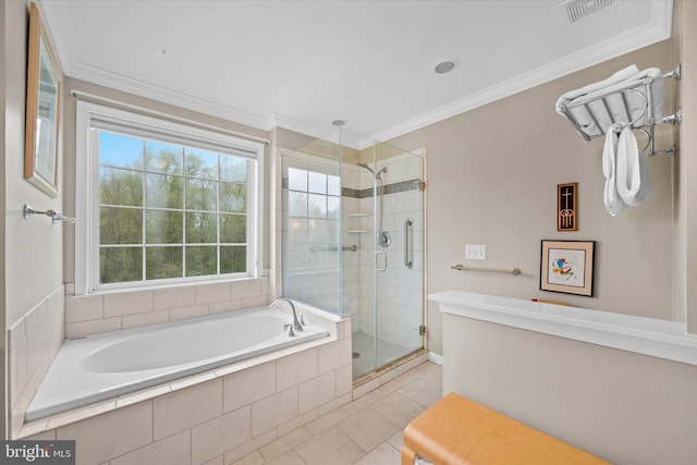bathroom featuring a stall shower, a wealth of natural light, tile patterned flooring, and a bath