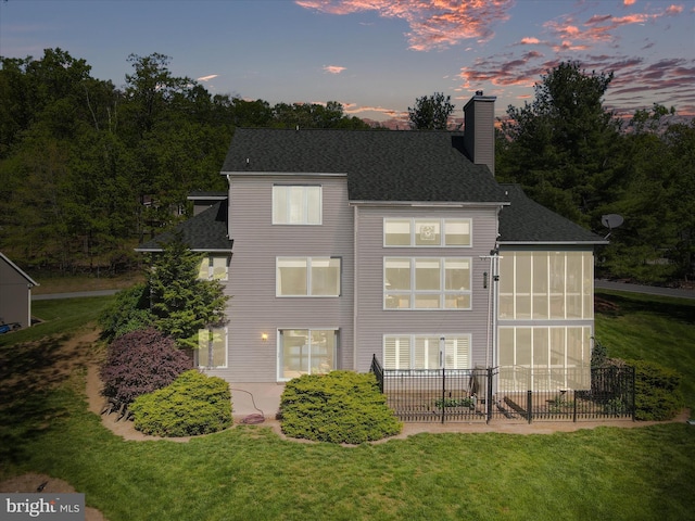 11 Spearpoint Ln, Hedgesville, WV 25427 - back of property with a lawn, a chimney, and a patio area