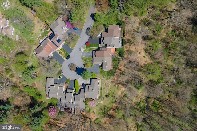 birds eye view of property with a residential view