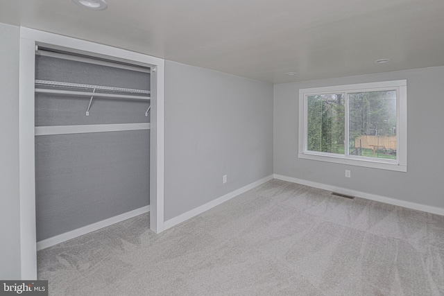 116 N 8th St Unit 2, Oakland, MD 21550 - unfurnished bedroom featuring carpet, visible vents, a closet, and baseboards