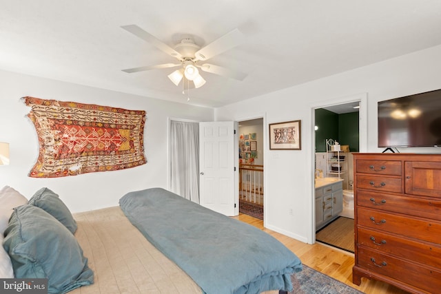 260 High Banks Rd, Stephenson, VA 22656 - bedroom with light wood finished floors, a ceiling fan, and connected bathroom