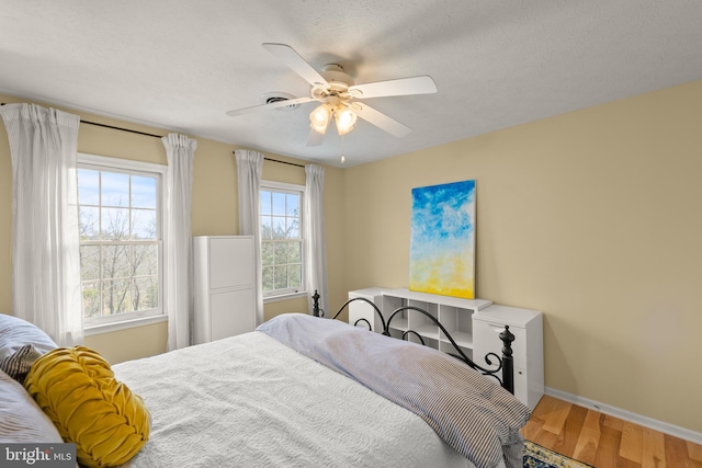 260 High Banks Rd, Stephenson, VA 22656 - bedroom featuring a ceiling fan, wood finished floors, and baseboards