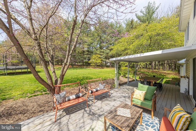 260 High Banks Rd, Stephenson, VA 22656 - wooden terrace featuring an outdoor living space, a trampoline, and a yard