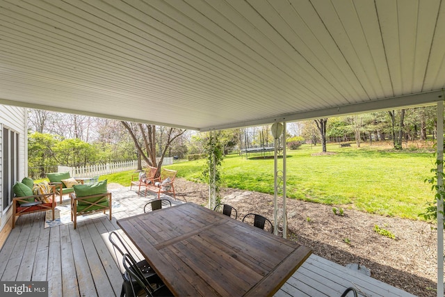 260 High Banks Rd, Stephenson, VA 22656 - wooden terrace featuring a patio, a trampoline, a yard, a fenced backyard, and outdoor dining space