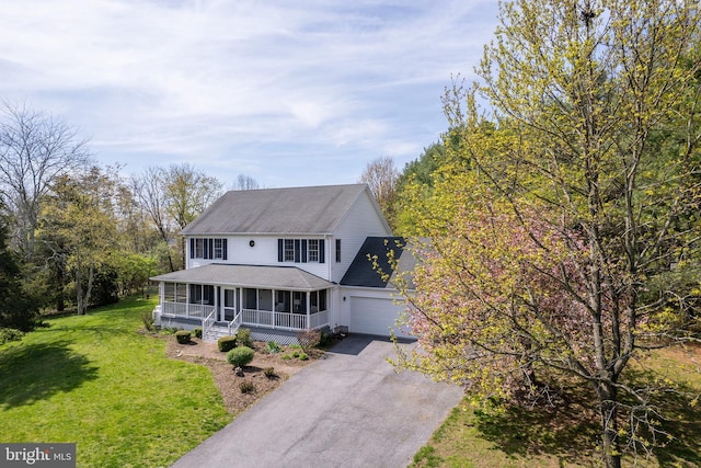 260 High Banks Rd, Stephenson, VA 22656 - view of front of home featuring covered porch, a shingled roof, driveway, a sunroom, and a front lawn