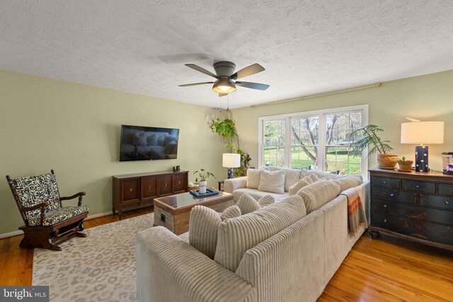 260 High Banks Rd, Stephenson, VA 22656 - living room with a ceiling fan, baseboards, wood finished floors, and a textured ceiling