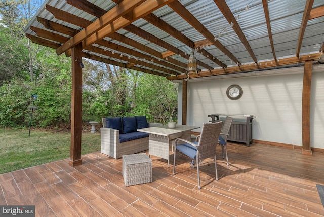 wooden deck with a lawn, an outdoor living space, outdoor dining area, and a pergola
