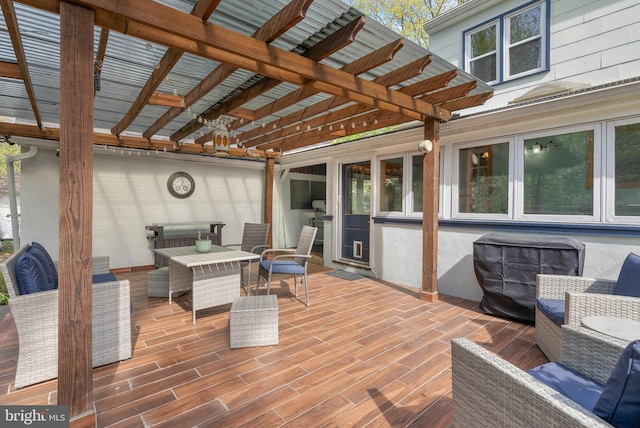 wooden deck featuring a pergola