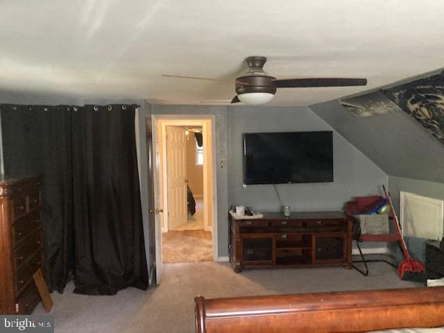 bedroom with ceiling fan and carpet