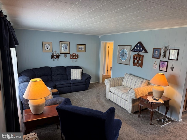 carpeted living area featuring crown molding