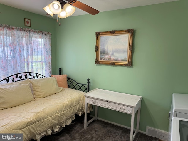 bedroom with visible vents, carpet, and baseboards