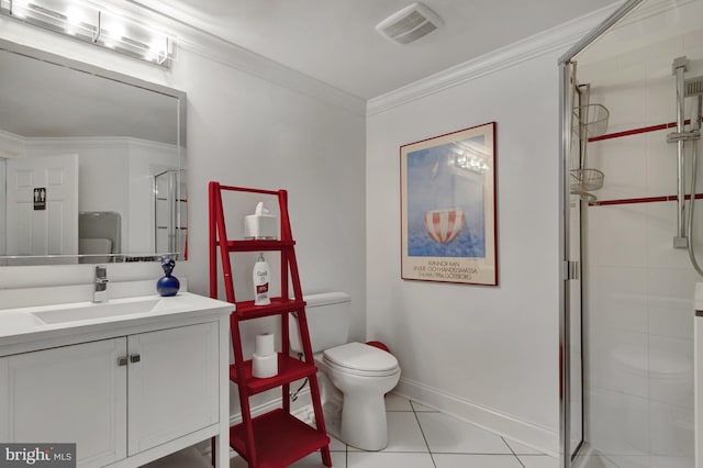bathroom with visible vents, vanity, toilet, baseboards, and a stall shower