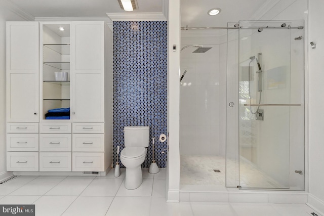 full bathroom with ornamental molding, a stall shower, and toilet