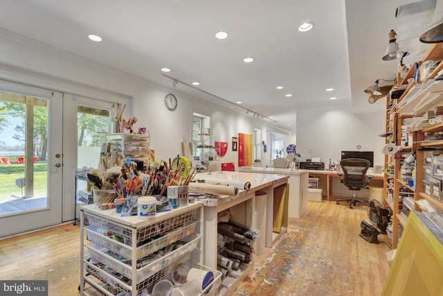 miscellaneous room featuring recessed lighting, ornamental molding, and light wood finished floors