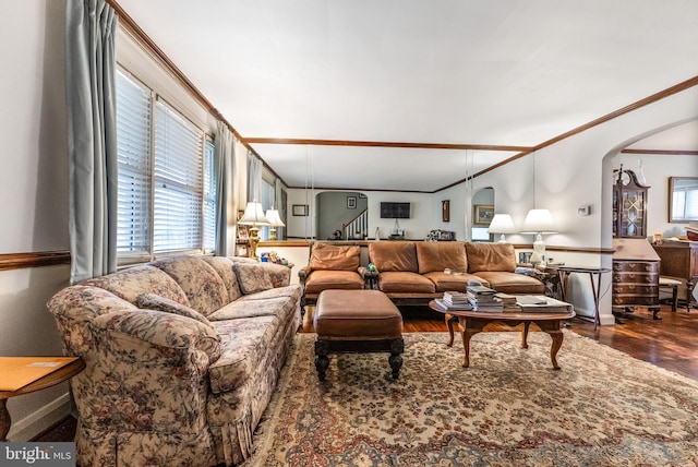 235 Medwick Garth E, Baltimore, MD 21228 - living room with arched walkways, ornamental molding, and wood finished floors