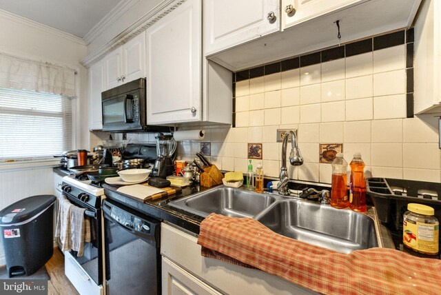 235 Medwick Garth E, Baltimore, MD 21228 - kitchen featuring a sink, black appliances, crown molding, white cabinetry, and decorative backsplash