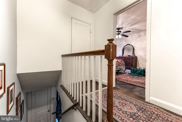 235 Medwick Garth E, Baltimore, MD 21228 - staircase with baseboards and ceiling fan