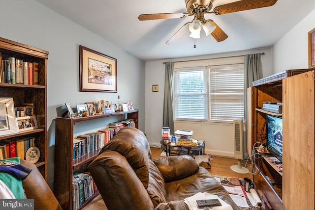 235 Medwick Garth E, Baltimore, MD 21228 - sitting room with ceiling fan, baseboards, and wood finished floors