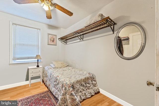 235 Medwick Garth E, Baltimore, MD 21228 - bedroom featuring a ceiling fan, wood finished floors, and baseboards