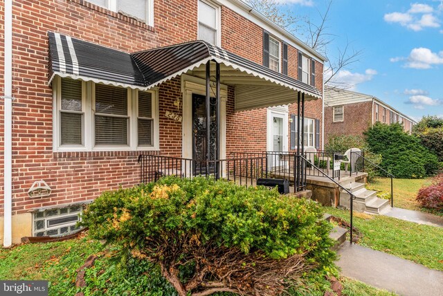 235 Medwick Garth E, Baltimore, MD 21228 - property entrance with brick siding