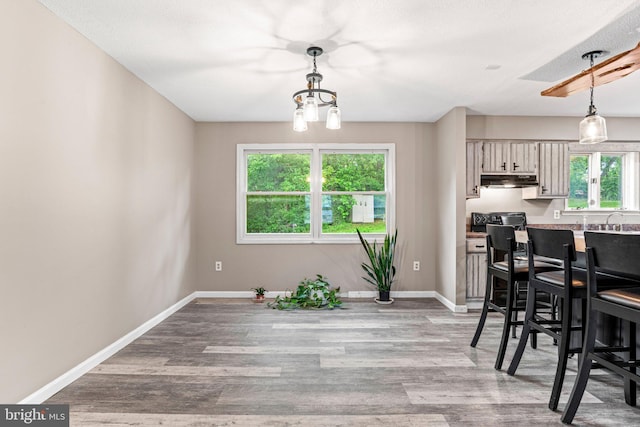 1604 Kathryn St, New Cumberland, PA 17070 - dining room with baseboards and light wood-style flooring