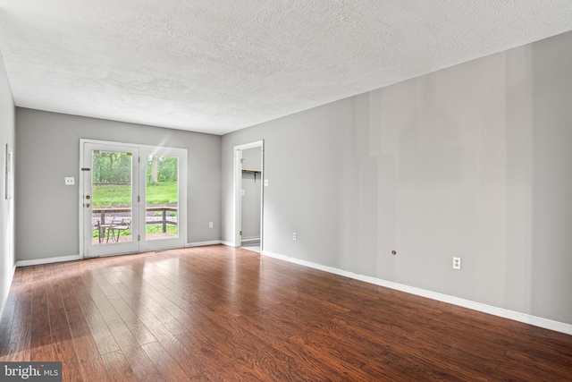 1604 Kathryn St, New Cumberland, PA 17070 - spare room featuring wood finished floors, a textured ceiling, and baseboards