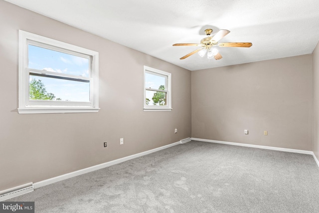 1604 Kathryn St, New Cumberland, PA 17070 - carpeted spare room featuring a baseboard radiator, a ceiling fan, and baseboards