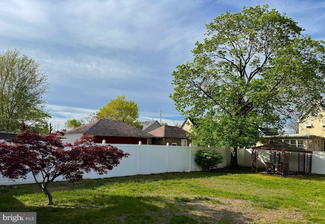 view of yard with fence