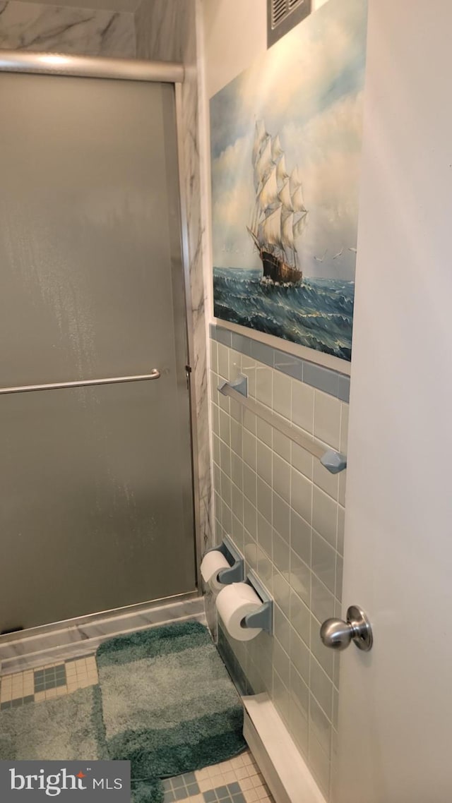 11 91st St Unit 102, Ocean City, MD 21842 - full bath with visible vents, tile patterned flooring, and a stall shower