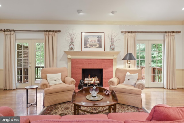 10204 Aspen Willow Dr, Fairfax, VA 22032 - living area featuring french doors, wood finished floors, a fireplace, and ornamental molding
