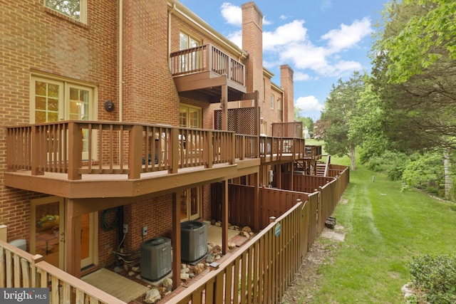 10204 Aspen Willow Dr, Fairfax, VA 22032 - deck featuring a lawn and central air condition unit