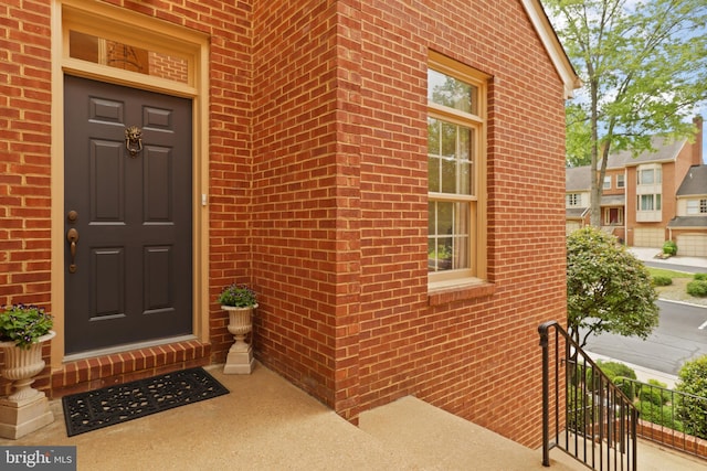 10204 Aspen Willow Dr, Fairfax, VA 22032 - doorway to property featuring brick siding