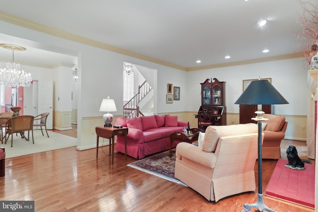 10204 Aspen Willow Dr, Fairfax, VA 22032 - living area featuring a wainscoted wall, wood finished floors, stairs, recessed lighting, and ornamental molding