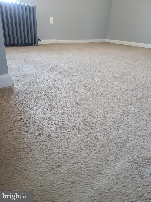 840 Cumberland St, Gloucester City, NJ 08030 - spare room with radiator, carpet, and baseboards