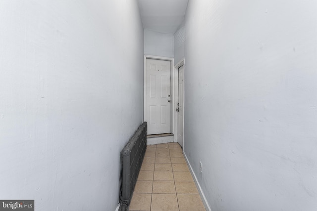 840 Cumberland St, Gloucester City, NJ 08030 - hallway with light tile patterned floors and radiator heating unit
