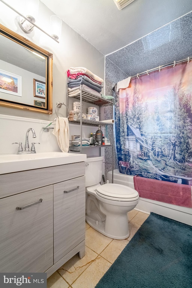 bathroom with toilet, tile patterned flooring, vanity, and shower / bathtub combination with curtain