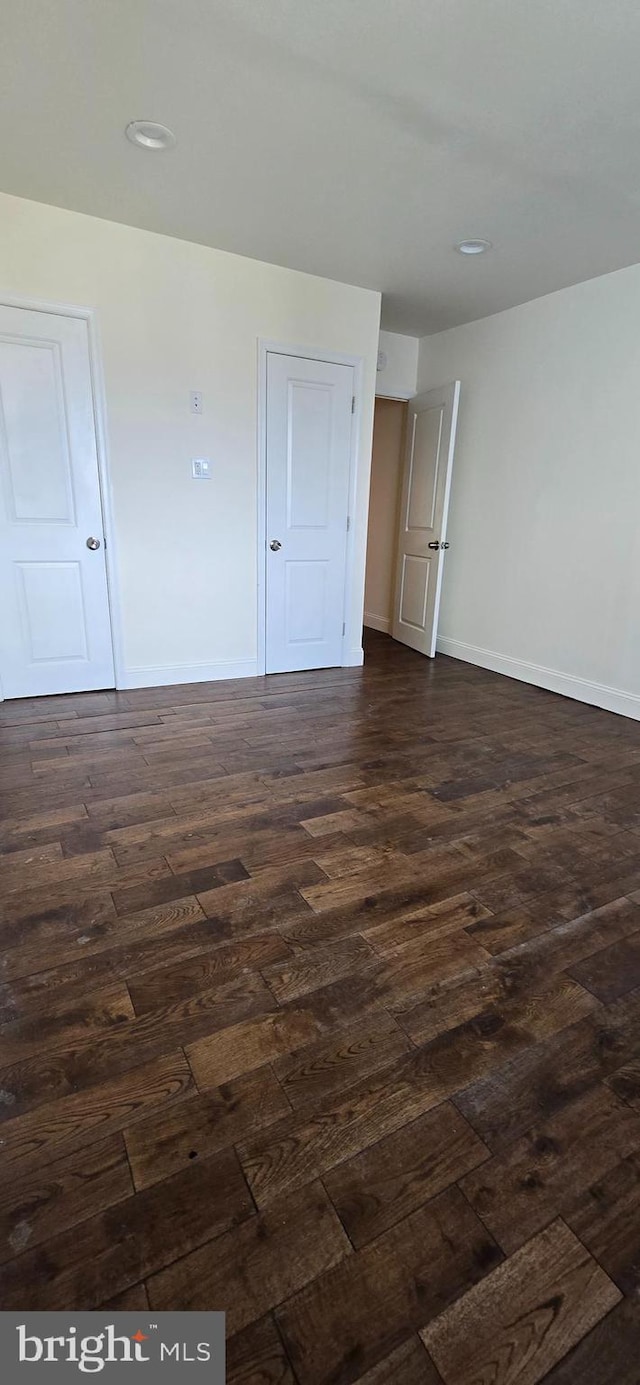 2113 E William St, Philadelphia, PA 19134 - unfurnished room featuring baseboards, recessed lighting, and dark wood-style flooring