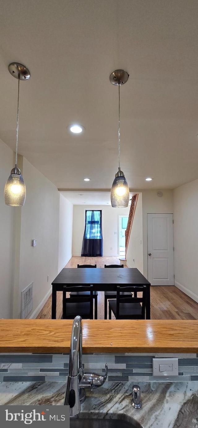 2113 E William St, Philadelphia, PA 19134 - dining room featuring recessed lighting, baseboards, visible vents, and wood finished floors