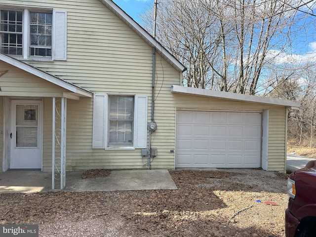 view of front of property featuring an attached garage