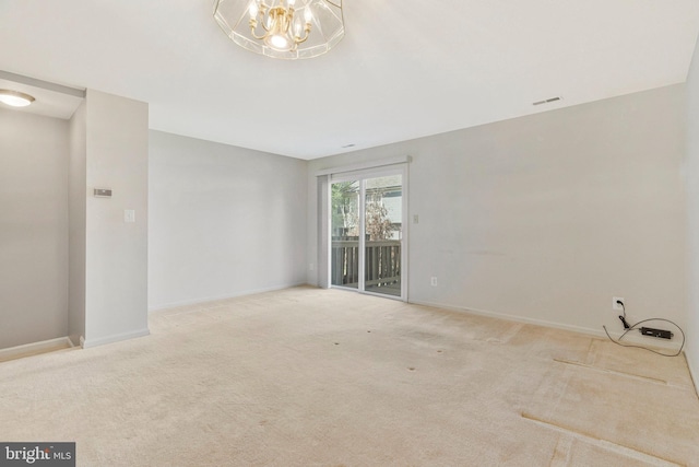 46726 Summit Ter Unit 136, Sterling, VA 20164 - carpeted spare room with a notable chandelier, baseboards, and visible vents