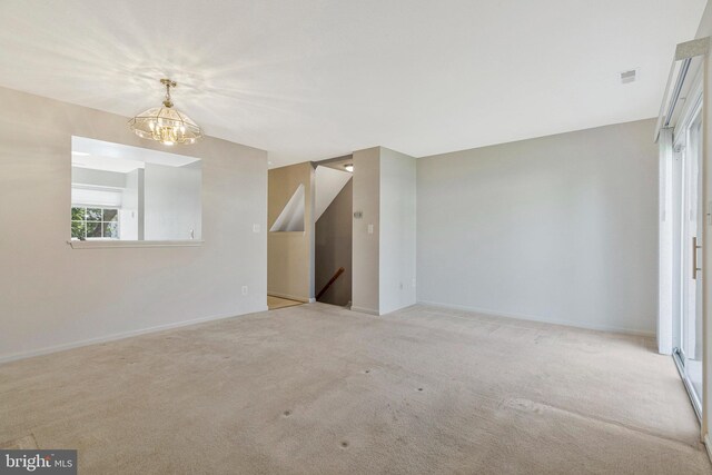 46726 Summit Ter Unit 136, Sterling, VA 20164 - interior space with carpet floors, baseboards, visible vents, and a notable chandelier