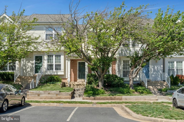 46726 Summit Ter Unit 136, Sterling, VA 20164 - townhome / multi-family property featuring brick siding and uncovered parking